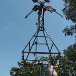 My daughter climbs up cyclecide's Axe Grinder