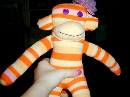 My sock monkey.. her name is Izabell. I bring here wherever I go.